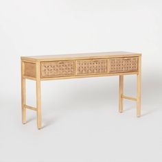 a wooden table with two drawers on it