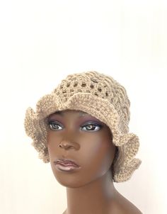 FREE WORLDWIDE SHIPPING ON ALL ITEMS For a limited time only. Welcome to my shop, all items handmade by me with passion READY TO SHIP I hand crocheted this lovely wavy cloche hat in the finest, softest oatmeal high quality woolblend yarn. One size fits all. Middle section is a beautiful lace effect pattern. Suitable for summer or winter wear. Guaranteed to add style to any wardrobe:) All items come with a gift tag and ribbon attached ready to be given as a gift. ❤️Shipping times: This item is re Cream Bohemian Crochet Hat With Adjustable Fit, Bohemian Lightweight Crochet Hat, Bohemian Knitted Short Brim Hat, Bohemian Cream Crochet Hat, Adjustable Beige Crochet Hat, Bohemian Lightweight Beige Crochet Hat, Bohemian Lightweight Hat, Bohemian Lightweight Crochet Hat With Wide Brim, Bohemian Cream Crochet Hat One Size