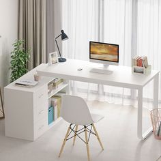 a white desk with a computer on it