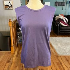 Brand New From Spain!! Massimo Dutti Unique Take On A Tshirt, Lavender Sleeveless Muscle Tee Crewneck With Slight Shoulder Pads, Tag Is In Euros! Size Small Open To Offers And Will Ship Bundles Of Multiple Items For Discounted Prices! Please Message With Questions, For Measurements Or Additional Pictures Smoke Free Home Casual Purple Cotton Tank Top, Spring Lavender Sleeveless Tank Top, Lavender Sleeveless Tank Top For Spring, Stretch Cotton Purple Tank Top, Purple Stretch Cotton Tank Top, Purple Stretch Tank Top, Stretchy Purple Cotton Tank Top, Sleeveless Lavender Cotton Top, Lavender Sleeveless Cotton Top