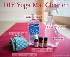 the instructions for diy yoga mat cleaner are displayed on a pink tablecloth with towels and bottles