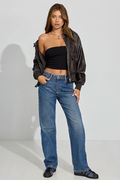 This essential 90’s look has never stopped serving. High rise and semi-fitted for a booty throwback that simply won’t quit, these straight leg jeans come in authentic non-stretch denim. Get that vintage denim look by rocking your favorite style from the past. Features - Five-pocket styling - Zip fly with button closure - Distressing throughout Size & Fit - Fit: Straight - Rise: 10.5" - Inseam: 32" - Model is wearing size 5 Materials & Care - Content: 75% cotton, 25% organic cotton - Care: Wash cold, inside out - Imported 90s Jeans Women, 90s Straight Leg Denim Bottoms, 90s Denim Blue Straight Leg Jeans, 90s Style Fitted Full-length Jeans, 90s Denim Blue Straight Leg Pants, 90s Jeans Outfit, Non-stretch Straight Blue Jeans, Teen Style, Dr Wardrobe