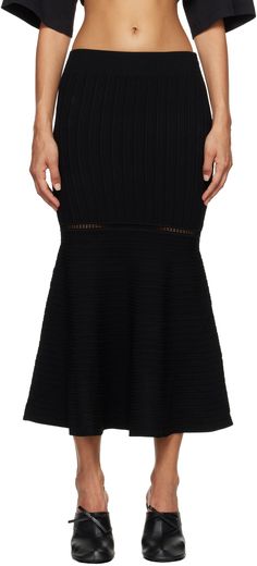 Textured knit stretch viscose-blend midi skirt. · Rib-knit elasticized waistband · Flared hem · Concealed zip closure at side seam Supplier color: Black Midi Flare Skirt, Black Flare, Black Midi Skirt, Textured Knit, Victoria Beckham, Apparel Accessories, Womens Bottoms, Rib Knit, Midi Skirt