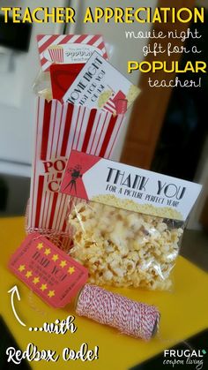 a popcorn box with some tags on it and the words teacher appreciation written in front of it