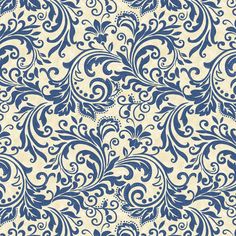 an ornate blue and white wallpaper pattern