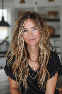 Long Layers with Feathered Waves Long Thick Layers Hair, Long Messy Layers Haircut, Long Layered Hair Beach Waves, Dimension Hair Color, Long Layered Permed Hair, Long Blonde Naturally Curly Hair, Long Hair With Texture, Long Hair At 40 Over 40, Cool Wavy Hairstyles