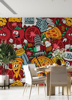 a dining room with a large mural on the wall next to a table and chairs