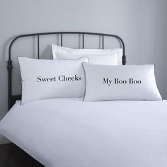 two pillows that say sweet checks and my boo boo on the pillowcase in black