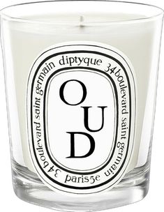 an image of a candle with the word oud on it