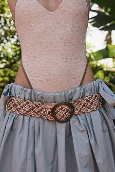 Forever cool and classic, this timeless waist belt is featured in a staple woven fabrication with head-turning circular buckle at center for an added special touch. | Ocean Side Waist Belt by Free People in Tan, Size: S/M Boho Clothing, Waist Belt, Turning, Siding, Free People, Buckle, Luxury Fashion, Turn Ons, Fabric