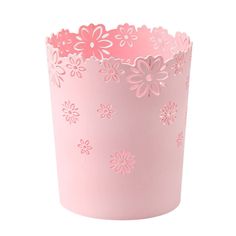 a pink paper cup with flowers on it