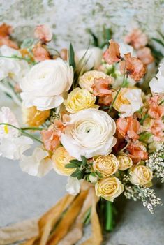 a bouquet of flowers sitting on top of a table