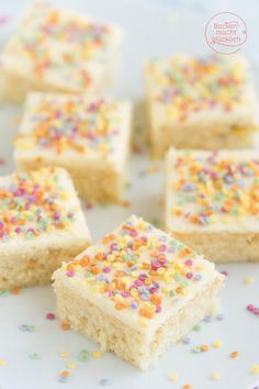 several pieces of cake with sprinkles on a plate