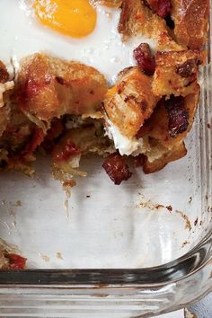 an egg and bacon breakfast casserole in a glass dish