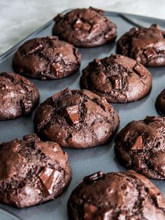 chocolate cookies are sitting on a baking tray