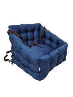 a blue dog bed sitting on top of a white floor next to a black leash