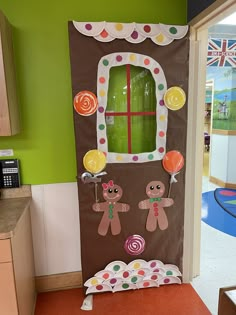 a decorated door in the shape of a gingerbread house