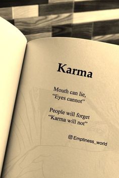 an open book with the words karma written in black and white on it's cover