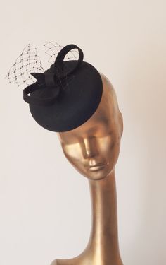 Please note that all items in my shop are made to order New Collection Fall 2016/17 Fascinator Unique Modern Black Felt Fascinator. Decorated with French Veil For parties and outdoors. Mounted with elastic rubber or slim headband Diameter : 16 cm Finished with lining and delicate petersham cotton grosgrain ribbon. If you need any info please contact me :) --------------------------- SHIPPING INFORMATION I will ship your purchased item within 6-9 business days after receiving payment to your addr Black Fascinator With Pinched Crown, Formal Hats With Adjustable Round Crown, Formal Adjustable Hat With Round Crown, Black Mini Hat With Short Brim For Church, Adjustable Black Mini Hat For Church, Elegant Black Mini Hats As Gifts, Black Cloche Fascinator With Adjustable Fit, Adjustable Black Cloche Fascinator, Black Mini Hat With Pinched Crown For Formal Occasions