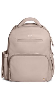 the large backpack is beige and has two zippers