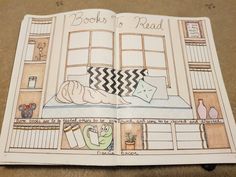 an open book with a drawing of a person sleeping on a bed in front of a window