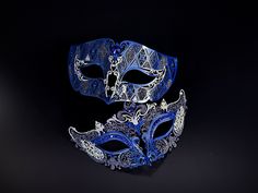 Designed to mesmerize, this extraordinary Blue mask is adorned with stunning blue sapphire rhinestones, making it an absolute show-stopper! Embellished with glitter for an added touch of glamour, making you and your partner stand out among the crowd. Be the center of attention at masquerade balls, proms, Halloween parties, or any event that demands a touch of elegance and mystery. Age Group/Gender - Adult/Unisex Size/Type - One size fits all adults Mask Color - Navy Glitter Color - Silver and na Elegant Blue Masquerade Mask For Parties, Blue Venetian Masquerade Mask For Party, Blue Venetian Masks For Masquerade, Blue Venetian Eye Mask, Blue Masquerade Mask For Mardi Gras, Blue Mardi Gras Masquerade Mask, Blue Eye Mask For Masquerade, Blue Eye Mask For Mardi Gras, Elegant Blue Mask For Masquerade