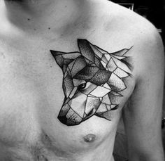 a black and white photo of a man's chest with geometric tattoos on it