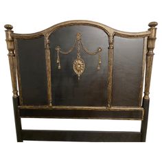 an antique style headboard with gold accents