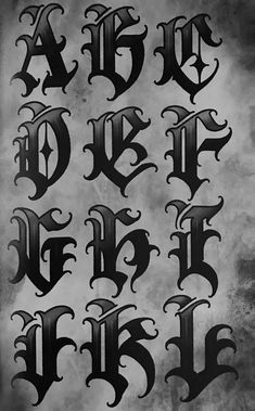 some type of gothic alphabet on a black and white background