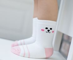 *Children character/animal socks. *Sock tags are finished with hand sewing to ensure maximum comfort and durability. *Flip tags up and snap buttons to keep socks together.  Wash and dry Linked Socks with buttons attached.  You will never lose socks to the dryer again! *Wear Linked Socks.   Solving your missing sock problems. **Linked Socks patent #10633787 Missing Socks, Animal Socks, Lost Socks, Sock Animals, Sewing Tags, Kid Character, Kids Socks, Cool Socks, Baby Size