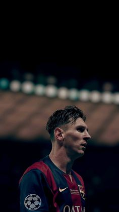 a man standing in front of a soccer ball