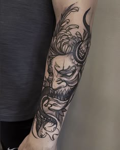 a person with a tattoo on their arm