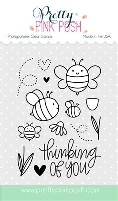 the pretty pink posh clear stamp set is shown, featuring two bees and one bee