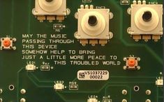 closeup of electronic circuit board with words on it