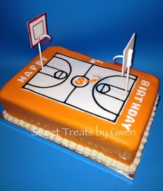 a birthday cake with a basketball court on it