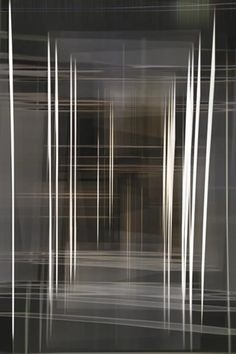 an abstract image of white lines on a black and grey background with room for text