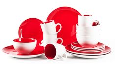 a red and white dinnerware set on a white background