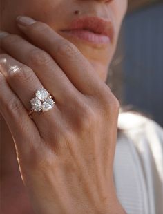 a close up of a person wearing a ring