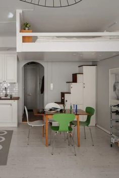 A loft bed with a staircase made out of storage cabinets A Loft Bed, Elevated Bed, Small Loft, Stylish Apartment