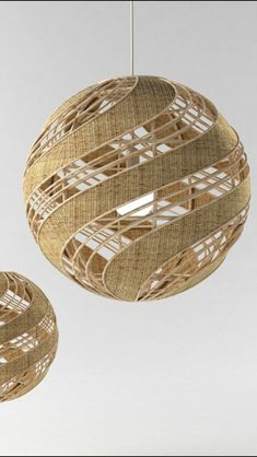 two wicker lamps hanging from the ceiling