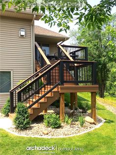 a wooden deck with stairs next to a house