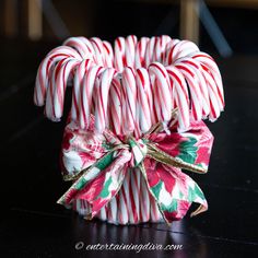 candy canes wrapped in pink and white paper