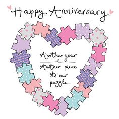 a heart shaped puzzle with the words happy anniversary