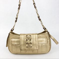 Gold Leather Shoulder Bag With Gold Metal Loop Strap By Yves Saint Laurent. In Good Pre-Loved Condition. Dust Cover Included. Gold Shoulder Bag With Palladium Hardware For Evening, Gold Shoulder Bag With Palladium Hardware, Chic Gold Shoulder Bag With Silver-tone Hardware, Bags Ysl, Saint Laurent Bags, Yves Saint Laurent Bags, Dust Cover, Gold Leather, Metallic Leather