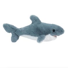 a stuffed shark is shown in the air