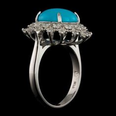 3.90 Carats Impressive Natural Turquoise and Diamond 14K Solid White Gold Ring Total Natural Oval Turquoise Weight is: Approx. 3.20 Carats Turquoise Measures: 12.00 x 10.00mm Natural Round Diamonds Weight: Approx. 0.70 Carats (color G-H / Clarity SI1-SI2) Ring total weight: 5.3 grams Disclaimer: all weights, measurements and colors are approximate and may vary slightly from the listed dimensions or as seen in the image. All pictures are magnified to show the smallest of details. Please, refer to Fine Jewelry Turquoise Diamond Ring, Elegant Turquoise Multi-stone Rings, Turquoise Diamond Ring With Center Stone, Elegant Multi-stone Turquoise Ring, Elegant Multi-stone Turquoise Gemstones, Hallmarked Turquoise Ring Fine Jewelry, Luxury Turquoise Diamond Ring As Gift, Elegant Turquoise Diamond Ring, Hallmarked Turquoise Fine Jewelry Ring