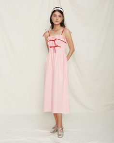 Embrace a touch of playful elegance with our Playful Pink Linen Dress, a delightful addition to any wardrobe. Handcrafted with care in Vietnam, this dress combines charm and comfort, making it perfect for a variety of occasions. Features: Premium Material: Made from 100% high-quality linen, providing exceptional comfort and breathability. Charming Design: Featuring delicate shoulder ties, a smocked bodice with ruffle trim, and adorable bow accents, this dress offers a playful and feminine look. Pink Linen Dress, Monaco Dress, Garden Parties, Pink Linen, Jacksonville Fl, Red Accents, Feminine Look, Linen Dress, Dress With Bow