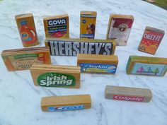 several different types of cheese on a white marble counter top with the word hershey's spelled out