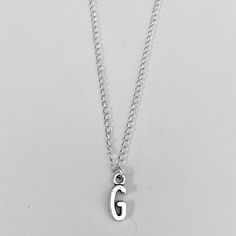 Anything Listed 3 For $49 Can Be Bundled For The Discount. Once You Have 3 Items Send The Offer For $49 And You'll Get One Shipping Charge. You Can Always Add More Items Just Send Me An Offer! New Silver "G" Initial Necklace Initial Is A Silver Plated Capital Letter Measures 10 Mm X 5 Mm 16" Silver Plated Dainty 3 Mm Curb Chain With A Lobster Clasp Closure And 1.5" Extender #Personalized #Uppercase #Capitalinitial #Monogram #Initialnecklace #Daintynecklace #Bridesmaidgift #Bride Moss Jewelry, Dainty Necklace, Initial Necklace, Silver Necklaces, Womens Jewelry Necklace, Bridesmaid Gifts, Initials, Monogram, Jewelry Necklaces