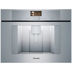 a stainless steel wall mounted oven with the door open to show it's water dispenser